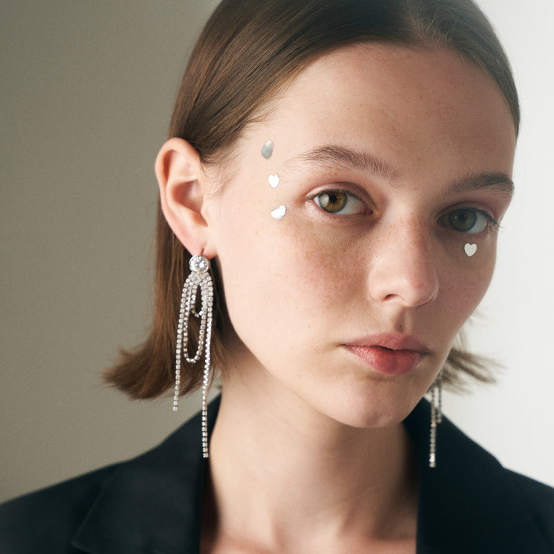 Oval long tassel earrings