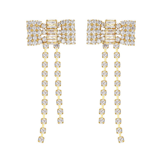 Boucles d'oreilles pompon nœud