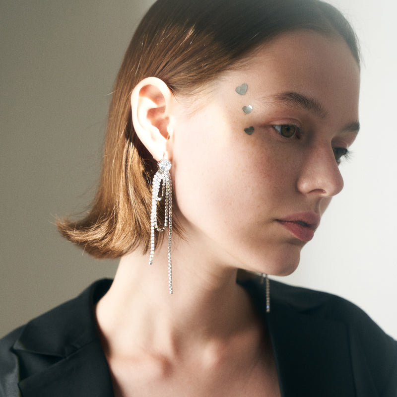 Oval long tassel earrings
